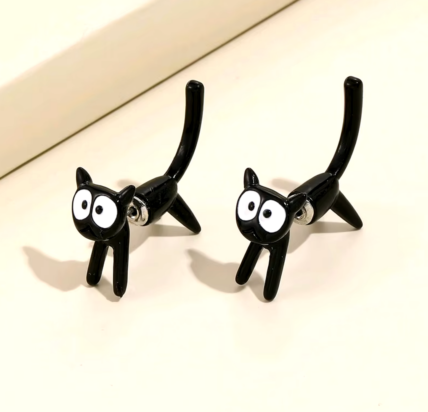 Aretes Gato