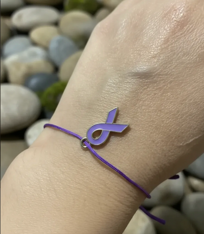 Pulsera Lazo morado con dije