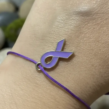 Pulsera Lazo morado con dije