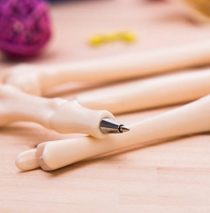 Pluma en forma de Hueso