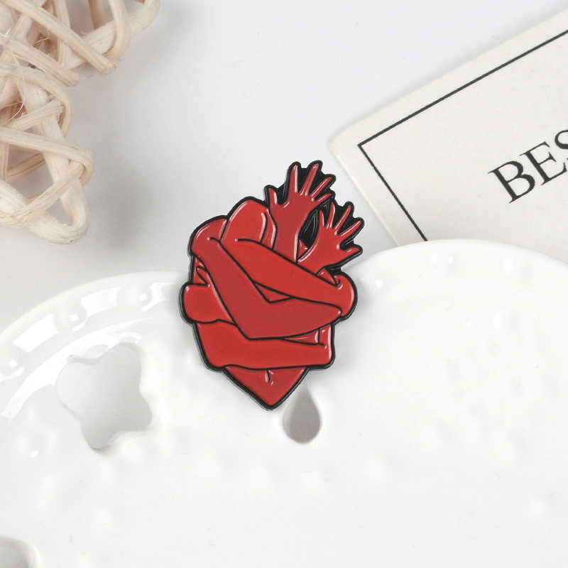 Pin Corazón abrazos