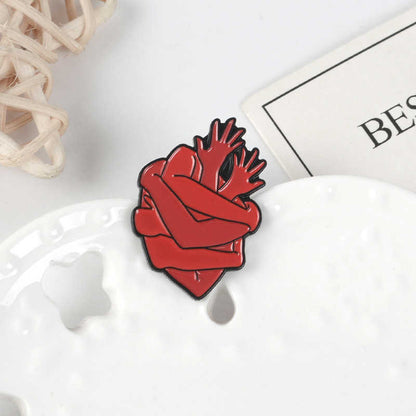 Pin Corazón abrazos